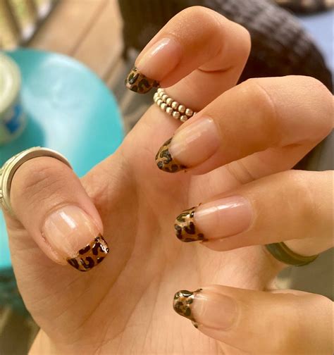 french tip nails leopard print.